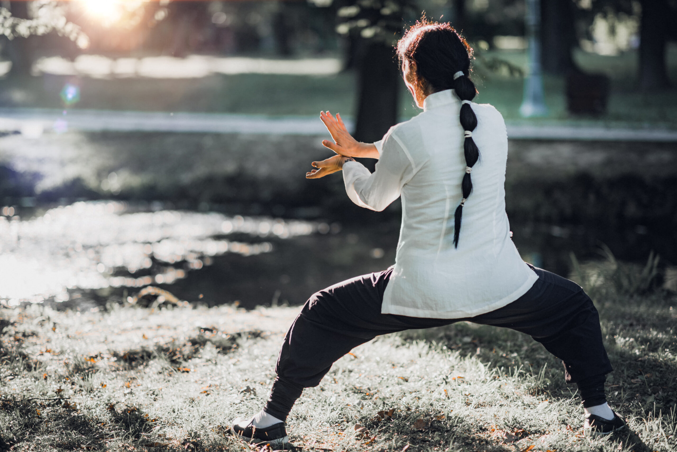 Woman practicing QI GONG